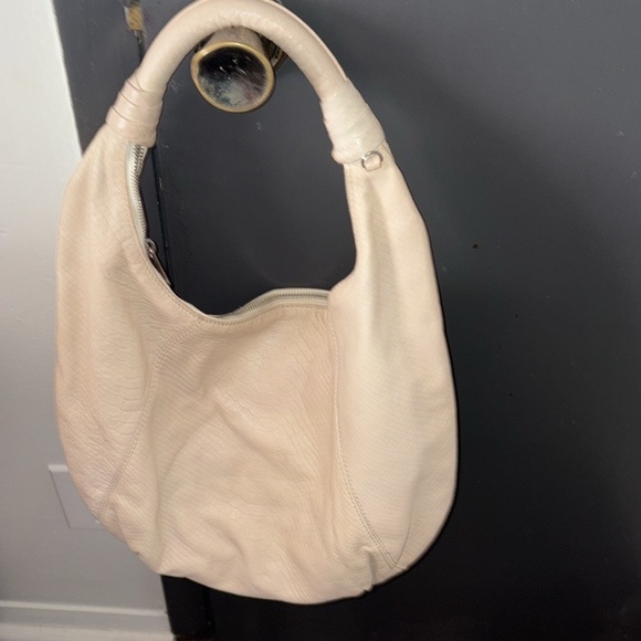 Gently used pebble leather Michael Kors Cream Hobo bag. - Picture 2 of 2